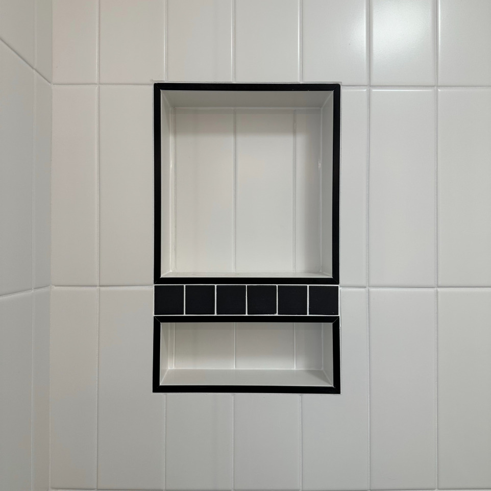 Custom niche in tiled shower